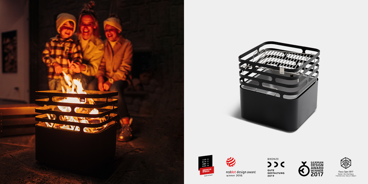 Une scène accueillante avec un brasero et une personne en arrière-plan, mise en valeur par la présence du höfats CUBE.