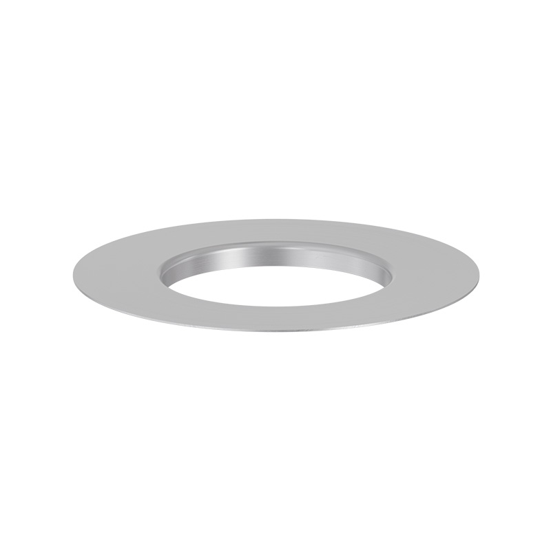 Szene, die einen Edelstahlring mit einem Loch in der Mitte zeigt, wobei der 00703 Spin 1200 Eco Ring durch seine praktische Eleganz hervorsticht.