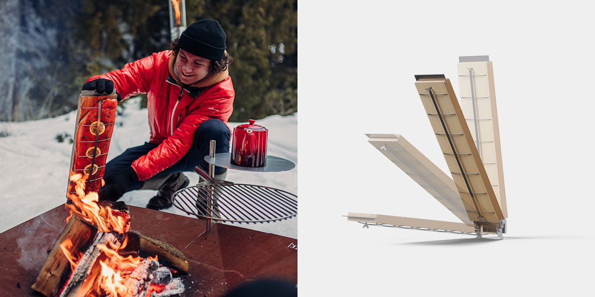 Un homme assis sur un banc à côté d'un feu, enrichi par la présence du plateau de saumon grillé sur les flammes qui allie design et utilité.