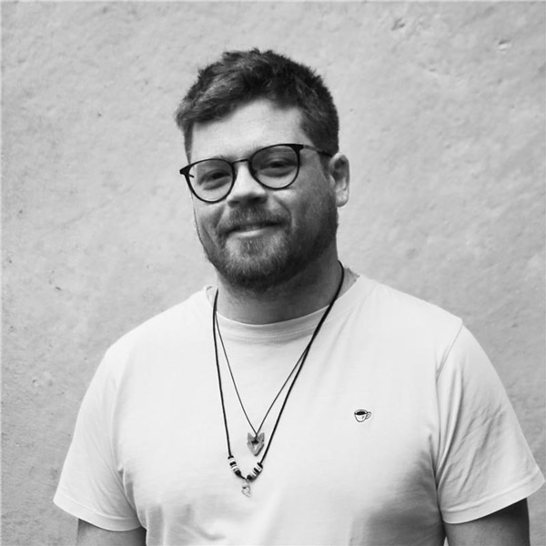 a man with glasses and a beard