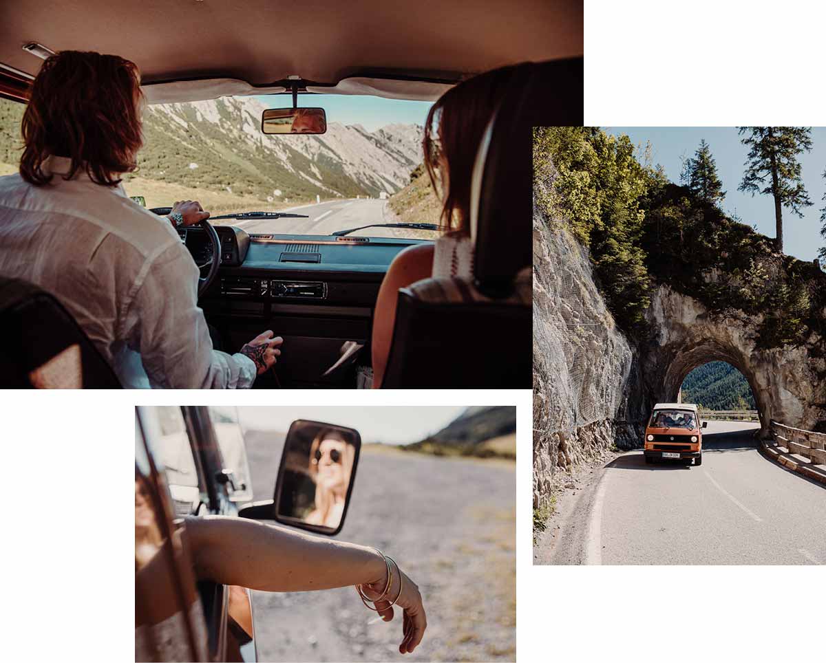 Eine Frau fährt ein Auto auf einer Straße.