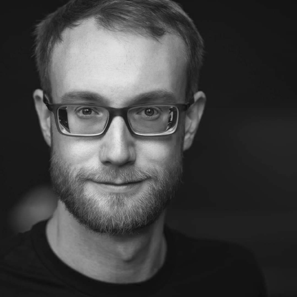 a man with glasses and a beard