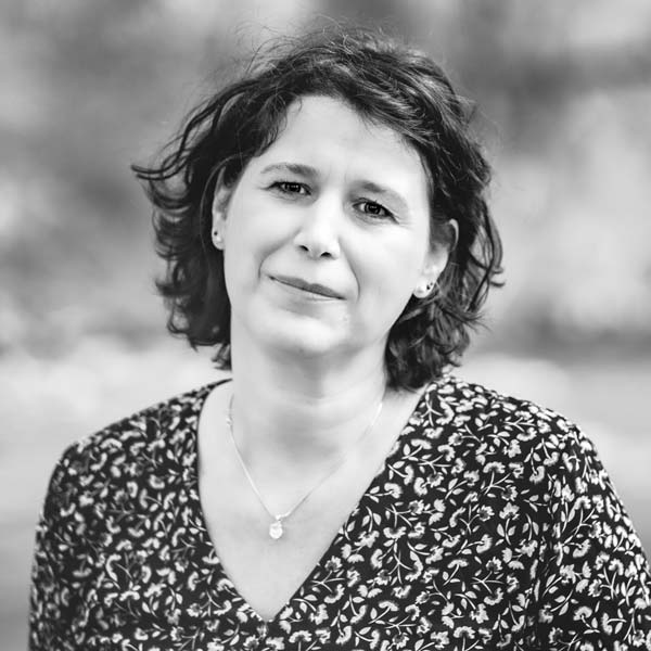 a woman in a black and white photo.