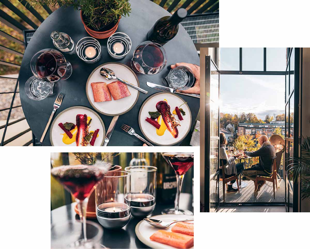 A table with plates and glasses of wine