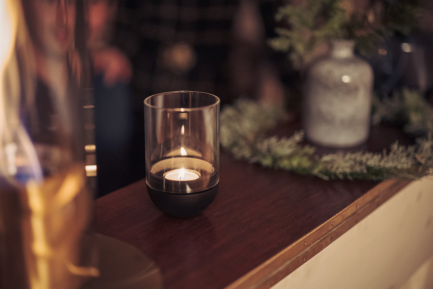 a candle on a table showing the black gravity candle