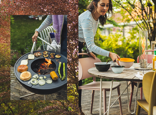 Eine Frau kocht draußen