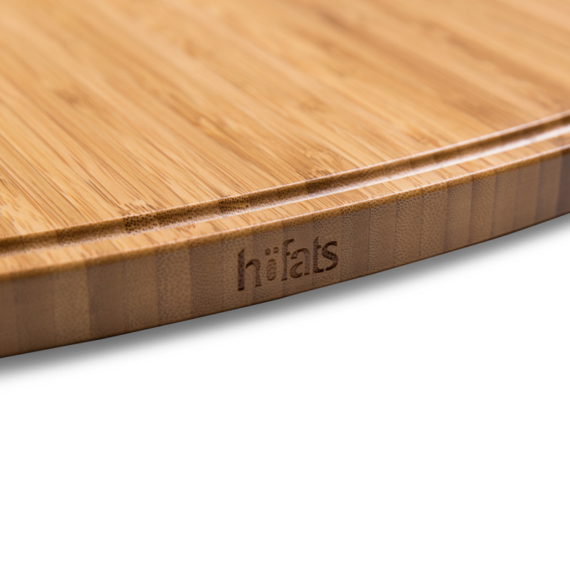 CONE Tablette Illustré est une Plancha à découper avec une poignée en bois, avec la Plancha CONE.