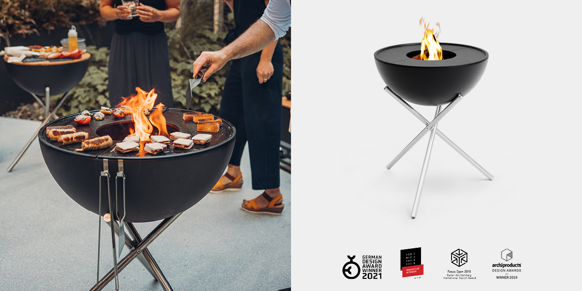 Un homme cuisine de la nourriture sur un gril.