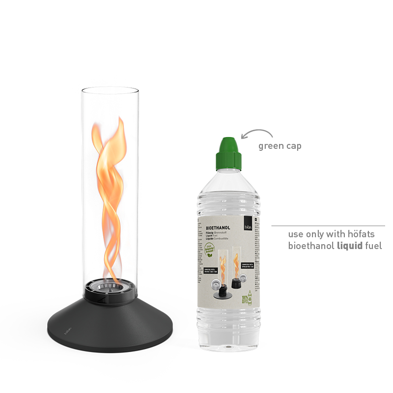 SPIN X 900 Tischfeuer schwarz Studiobild, daneben Bioethanol flüssig Studiobild