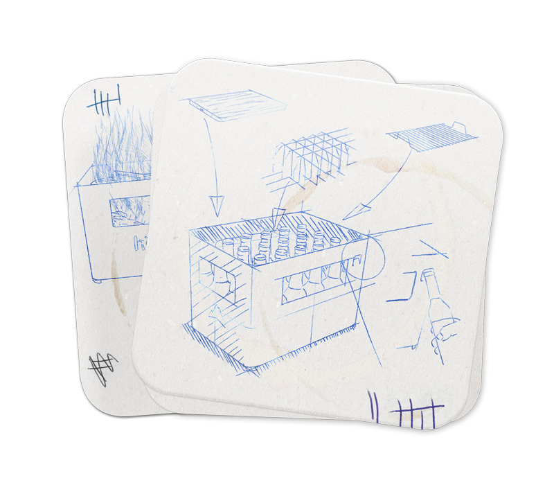 a piece of paper with blue ink on it showing scematics of the beer box