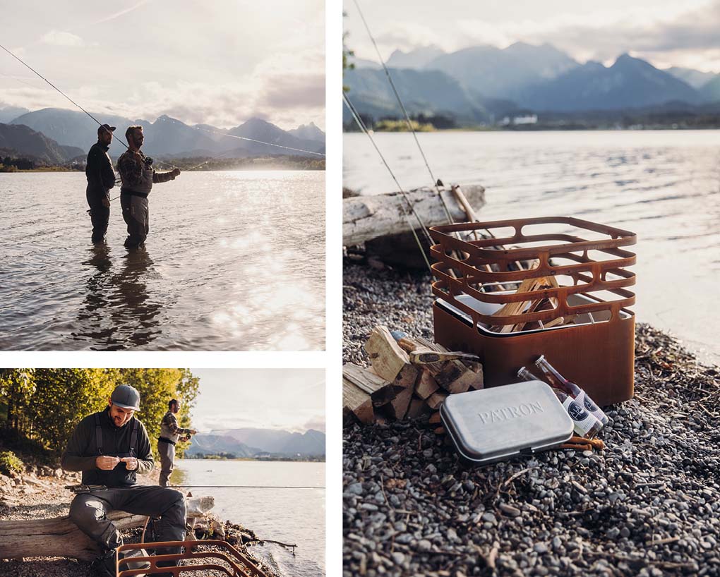The photo presents a man fishing on the shore of a lake