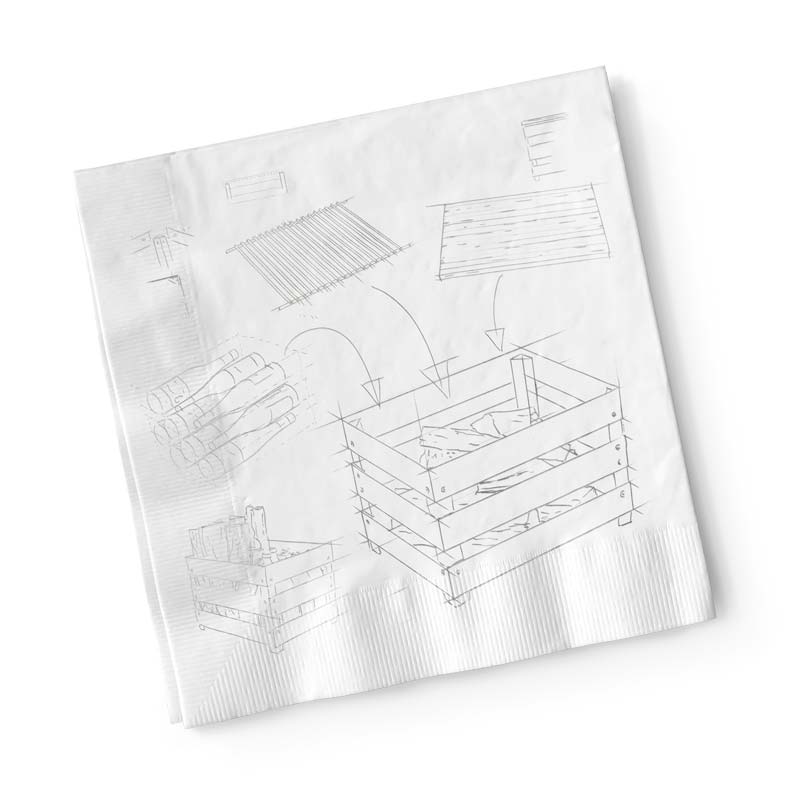 Ein Bild zeigt eine Serviette mit einer Zeichnung eines Hauses, mit dem CRATE Feuerkorb.