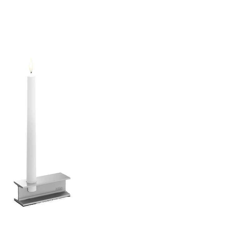 a white candle with a single flame.