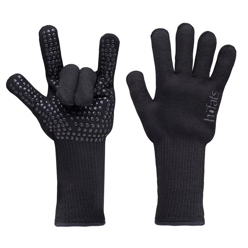 Feuerhandschuhe Aramid Das Foto zeigt ein Paar schwarze Handschuhe mit schwarzen Punkten, die Fire Gloves Aramid.