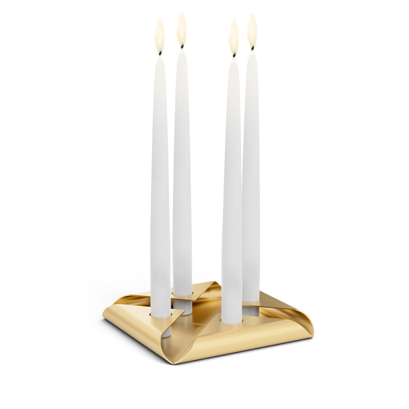 SQUARE CANDLE Candleholder gold An image showing a pair of candles on a gold stand, with the SQUARE CANDLE Candleholder Set gold.