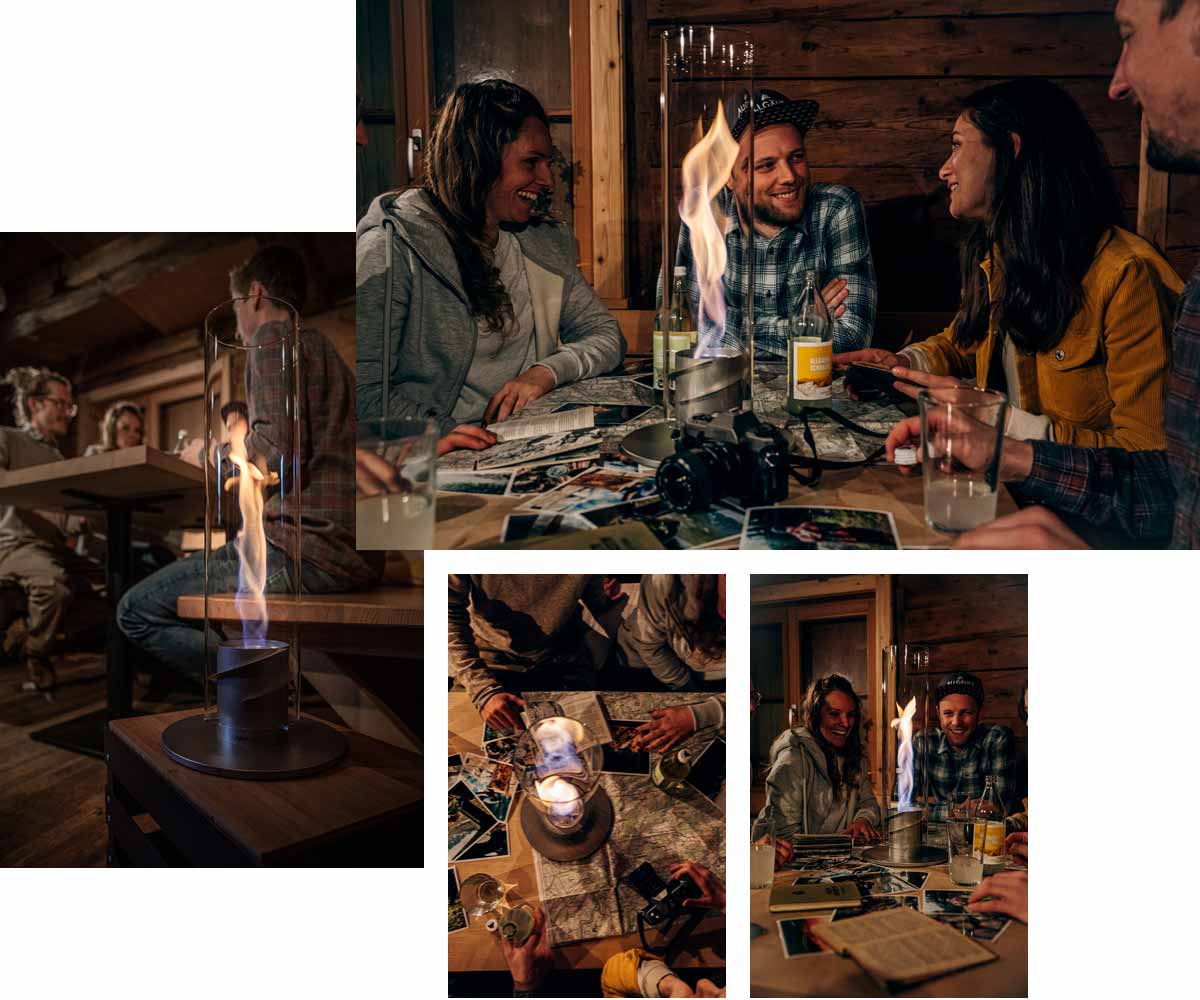 The photo presents a collage of people sitting around a table, with the SPIN 120 Table Fire silver.