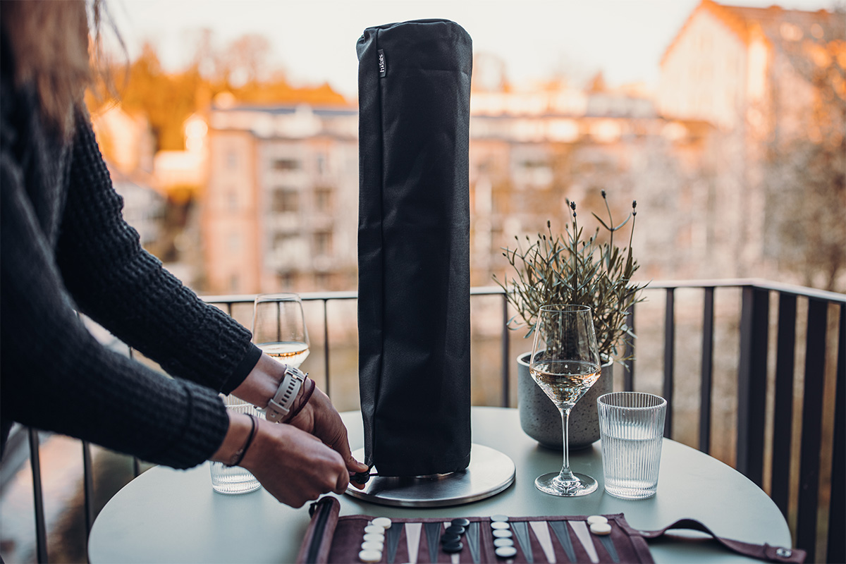 SPIN 900 Cover Depicted here is a woman is sitting at a table with a wine bottle, with the SPIN 1200 Cover.